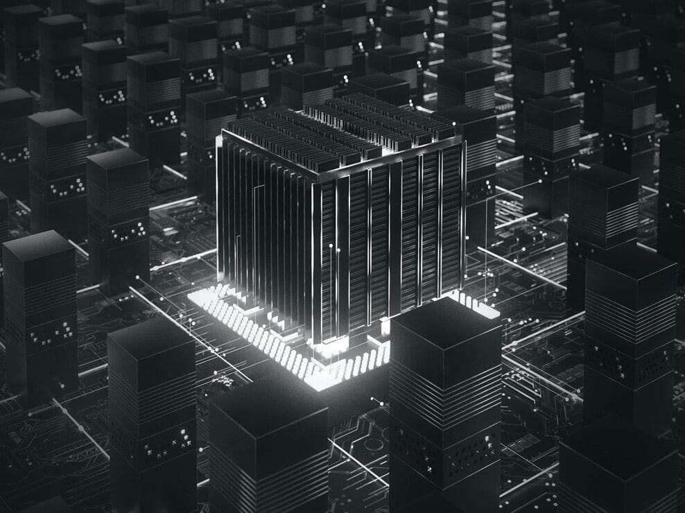 Monochrome circuit-board cityscape with a glowing Ratanx chip tower
